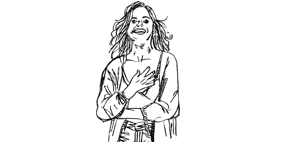 Woman placing hand on heart while smiling