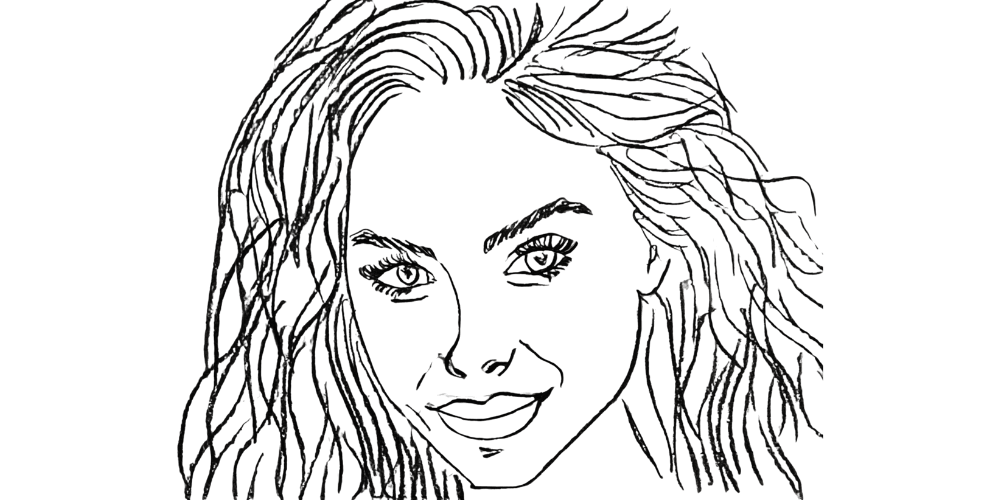 Close-up of a serene woman with flowing hair