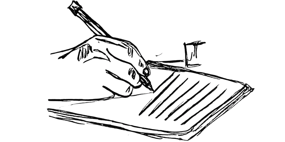 Hand writing a self-compassion letter on lined paper