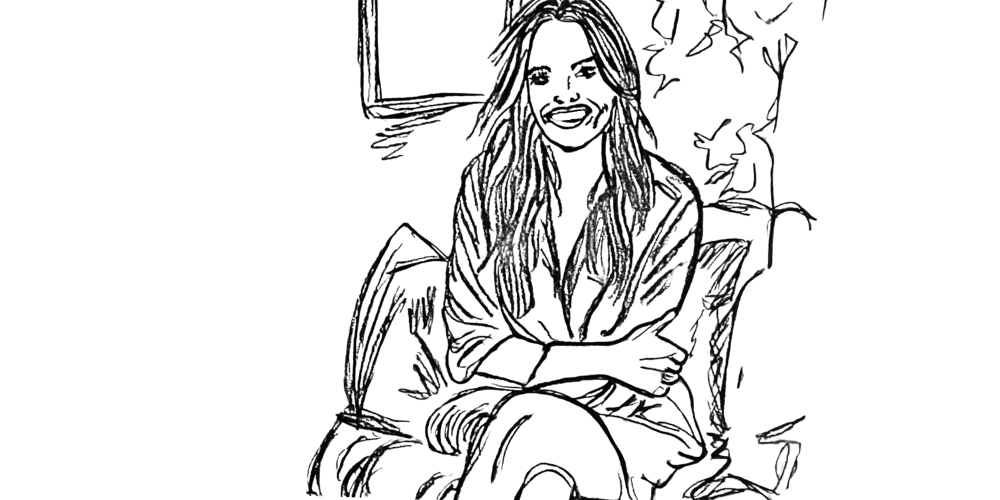 Woman sitting comfortably and smiling