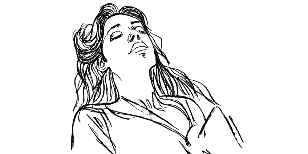 A woman breathing deeply with eyes closed, symbolizing release of guilt and emotional freedom.