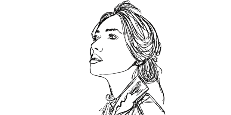 A woman with her head slightly lifted and eyes closed, listening to her inner voice in silence.