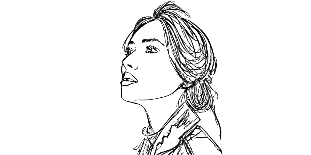 A woman with her head slightly lifted and eyes closed, listening to her inner voice in silence.