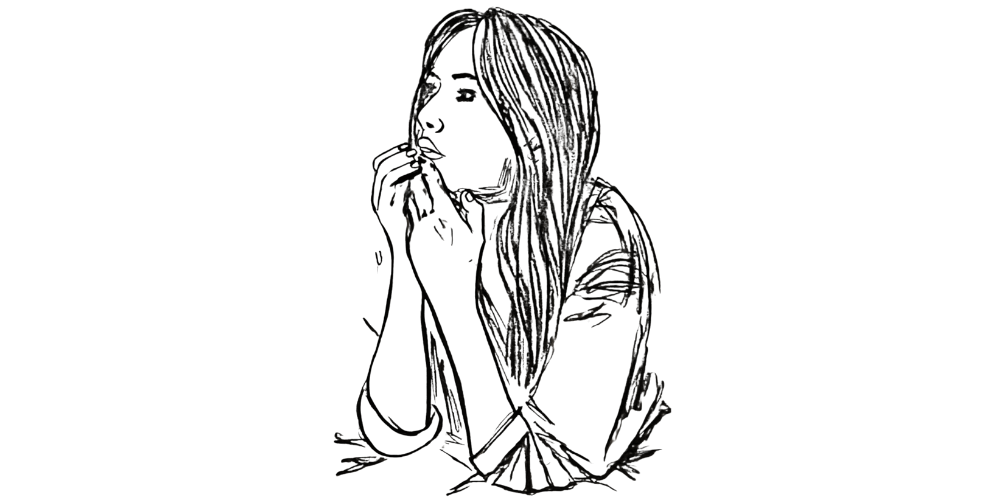 A reflective woman leaning on her hand, gazing into space in silent contemplation.