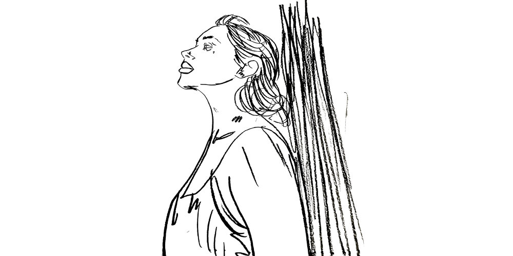 Redefining success — mindful woman journaling at her desk, feeling content (Mibosma).